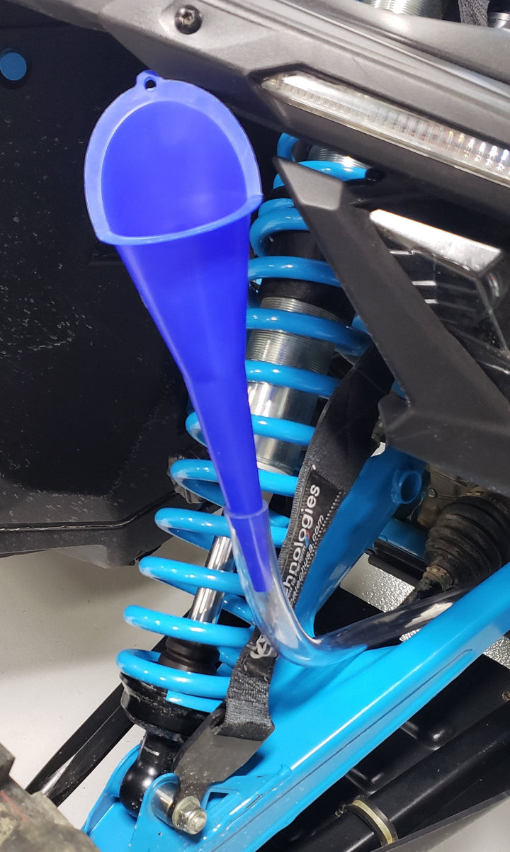 Can-Am X3 Differential Fill Adapter Tool Use the aluminum adapter, thread it into the fluid fill plug where the stock X3 plug is, attach the supplied hose, run to an easy to accessible location and use your favorite funnel in the hose to fill your X3 with fluid. When your done just detach the hose from the adapter, unthread it, and reinstall the plug. It's really that easy.